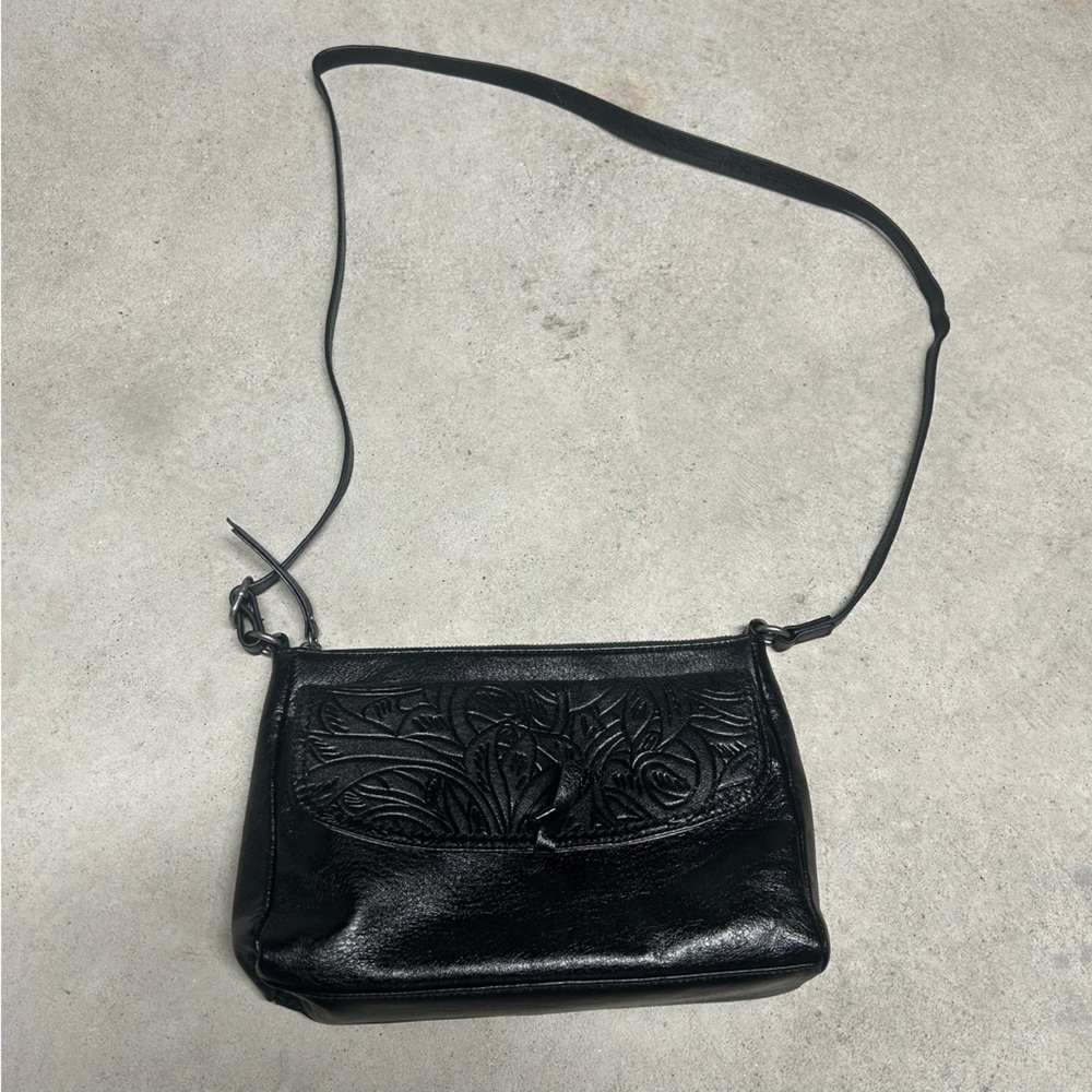 The Sak Ventura Small 100% Leather Crossbody Black Onyx Leaf Floral Printed